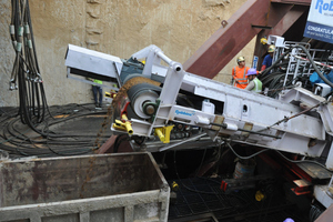  6	Abraumtransport über das TBM-Förderband. Der Baugrund oberhalb des Grundwasserspiegels besteht vornehmlich aus schluffigen Sanden 