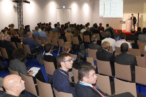  	Paper being presented in a hall during the AFTES Congress 