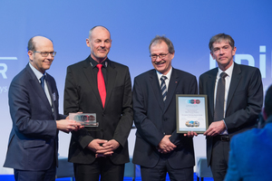   Renzo Simoni (former CEO of AlpTransit Gotthard AG, 2nd from the left) and Peter Jedelhauser (SBB, 2nd from the right) received the 2018 European Railway Award in Brussels on behalf of everyone involved in building the Gotthard Base Tunnel and putting it into operation 