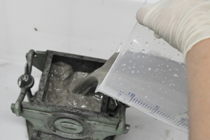  b) Filling the mould; 
 