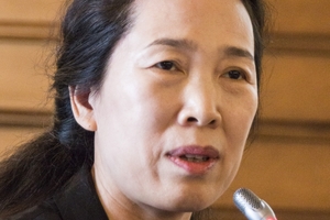  15	Jinxiu (Jenny) Yan was chosen as ITA president for  three years by a narrow margin of 32 to 30 votes 