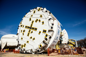  The original, 11.6 m diameter machine during its acceptance ceremony, with its adaptable cutterhead including removable spacers and adjustable bucket lips to convert to a smaller diameter 