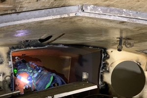  The TBM skins had to be accessed and removed inside the tunnel. Due to lack of space, the skins had to be cut into sizes that could be managed and handled by personnel. This image shows the process of skin removal after the roof shield had been pinned 