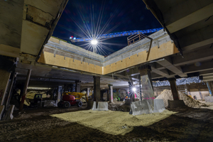  8	Excavation work on Munich‘s Marienhof is in full swing: the approx. 320 m long diaphragm wall around the excavation pit, the 50 to 68 m deep primary supports, the 1.20 m thick concrete deck slab  and the first level under the deck slab have already been constructed 