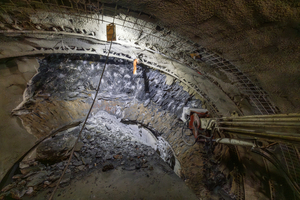  Cramberg Tunnel: Excavation of the rock with the hydraulic impact hammer of the Tunnel Enlargement System 