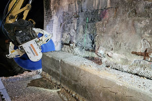  A cut through the cable duct – with little dust thanks to water spraying. The exposed piece of concrete is then prised loose and loaded for removal 