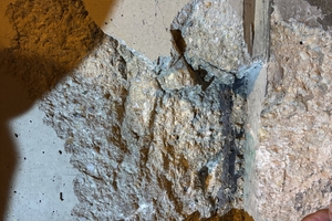  6	Exposed area of spalling and exposed swellable profile at the interface between the old and new concrete 
