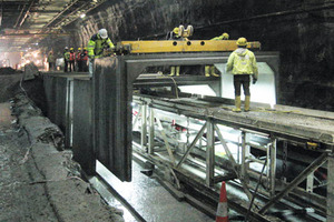  Transfer and installation of the prefabricated elements for the escape tunnel with the heavy duty crane 