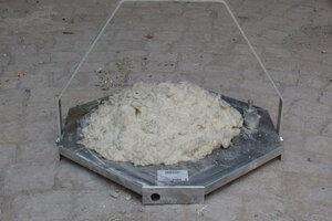  Accurate laboratory testing of the same ground sample, as in the slump test seen here, aided contractors in developing an effective ground conditioning regime 