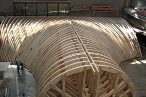  Fabrication of the top shuttering from the main tunnel to the transverse smoke-extraction gallery, showing the square-timber trestle substructure  