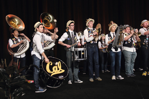  11)	The University of California Marching Band provided a swinging musical interlude | 