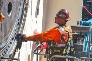  A crew member inspects the TBM during Onsite First Time Assembly 