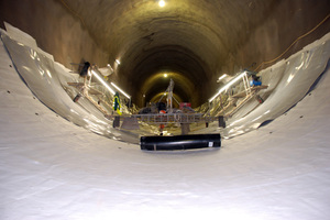  Mechanically attached fabric as protective geotextile at the slope side against the rough shotcrete 