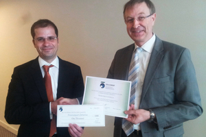  Francesco Colella (33, on the left) being awarded the COSUF Prize from animateur Roland Leucker 