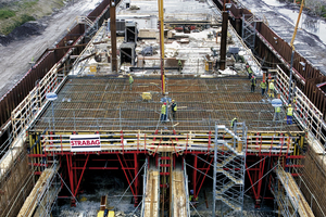  1 5 tunnel elements each 100 m long are precast with formwork carriages in the dry dock 