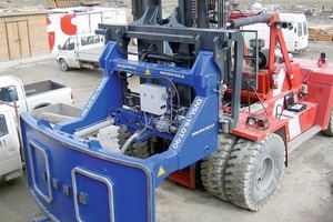  Fork-lift truck attachment to permit handling of segmental lining components  