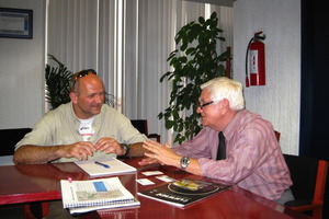  José Miguel Guevarra, Emisor Oriente project manager patiently briefs the tunnel editor-in-chief  