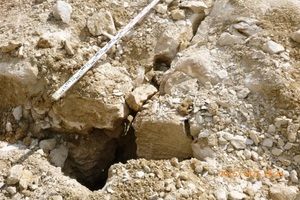  12)	Karst cleft filled with loam in the construction pit slope | 